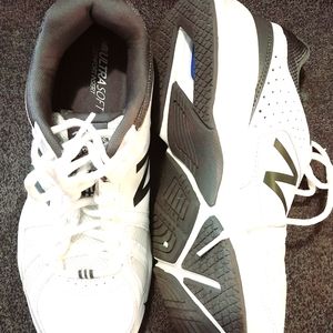 New Balance 519 white cross training shoes